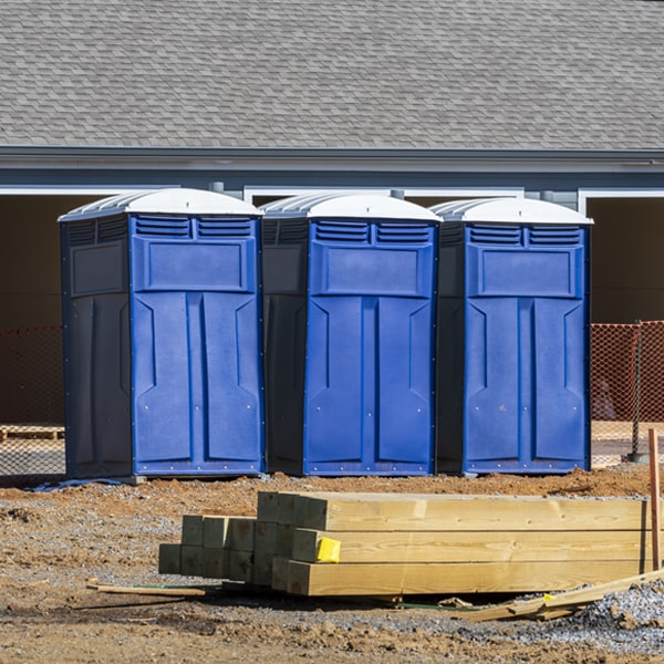 what is the cost difference between standard and deluxe portable toilet rentals in Clare Illinois